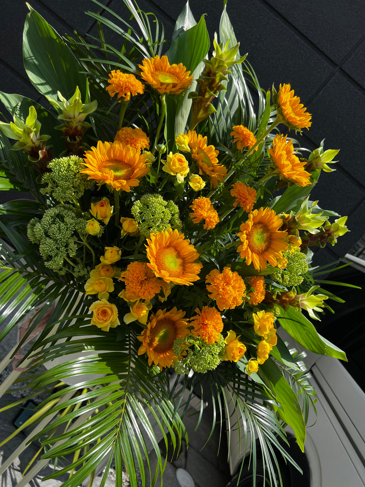 フローリストお任せオレンジスタンド花