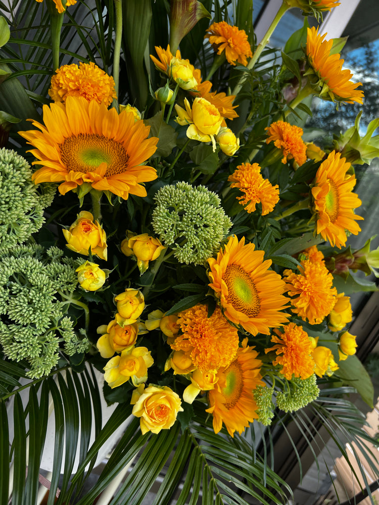 フローリストお任せオレンジスタンド花