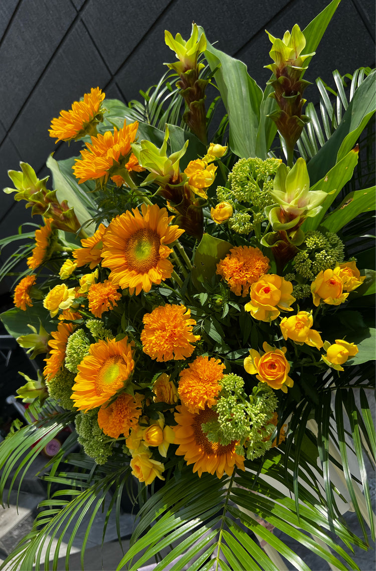 フローリストお任せオレンジスタンド花